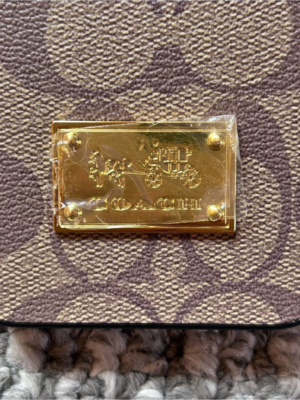 Coach Brown Monogram Phone Case with Gold Plaque